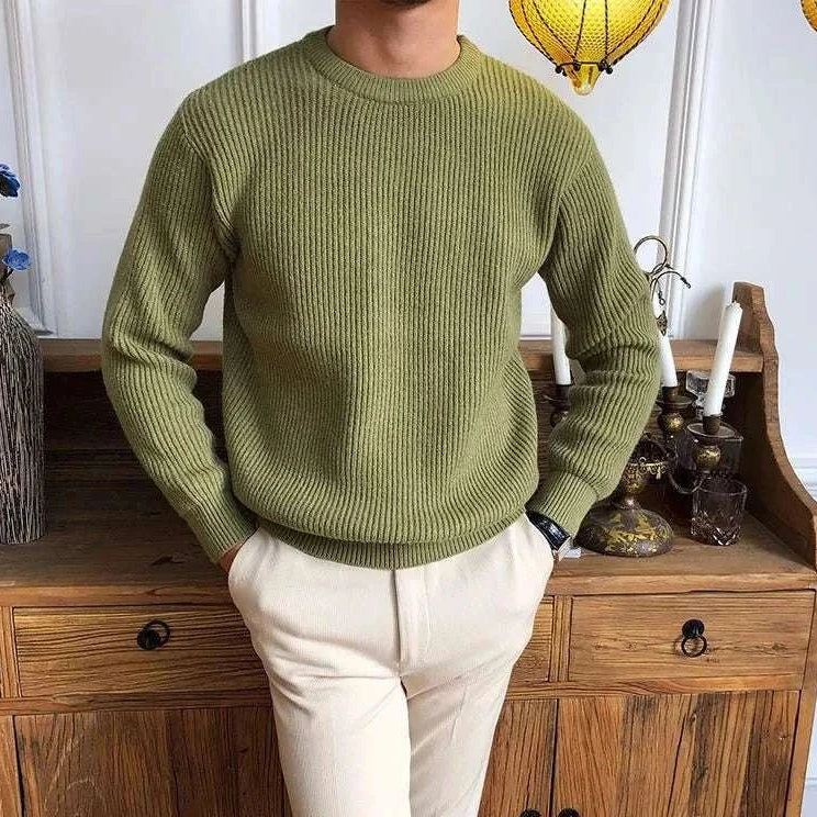 Antonios solid round neck knit sweater in olive green color displayed on a model.