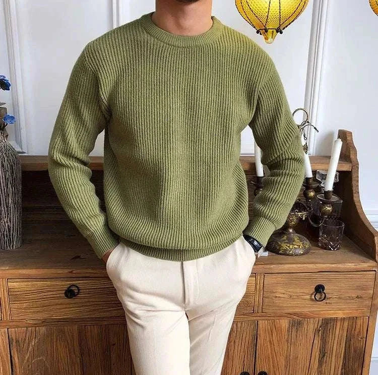 Antonios solid round neck knit sweater in olive green color displayed on a model.