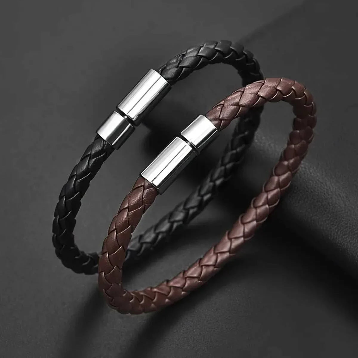 Business PU leather bracelet in black and brown with sleek design and metal clasps.