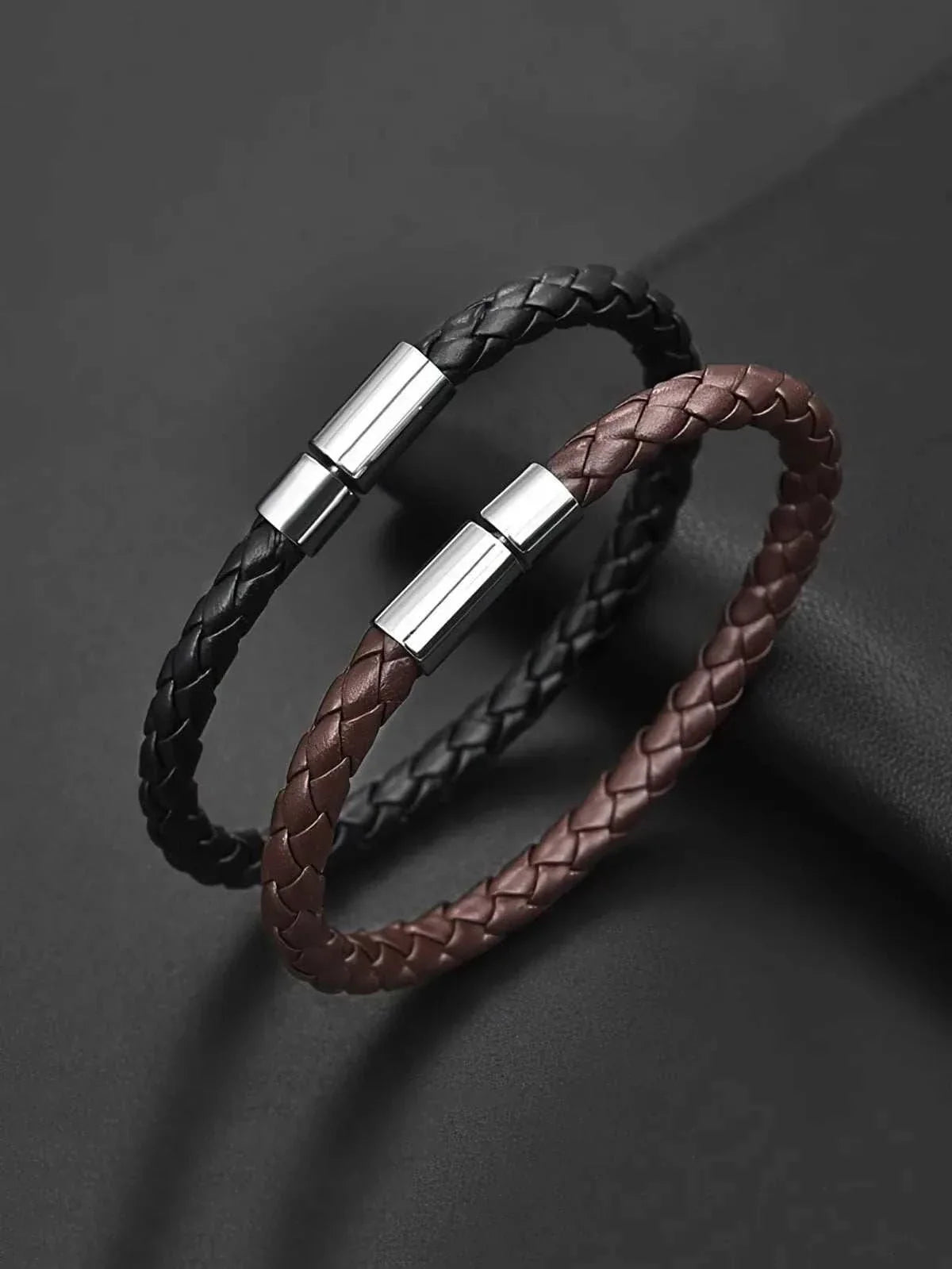 Business PU leather bracelet in black and brown with sleek design and metal clasps.