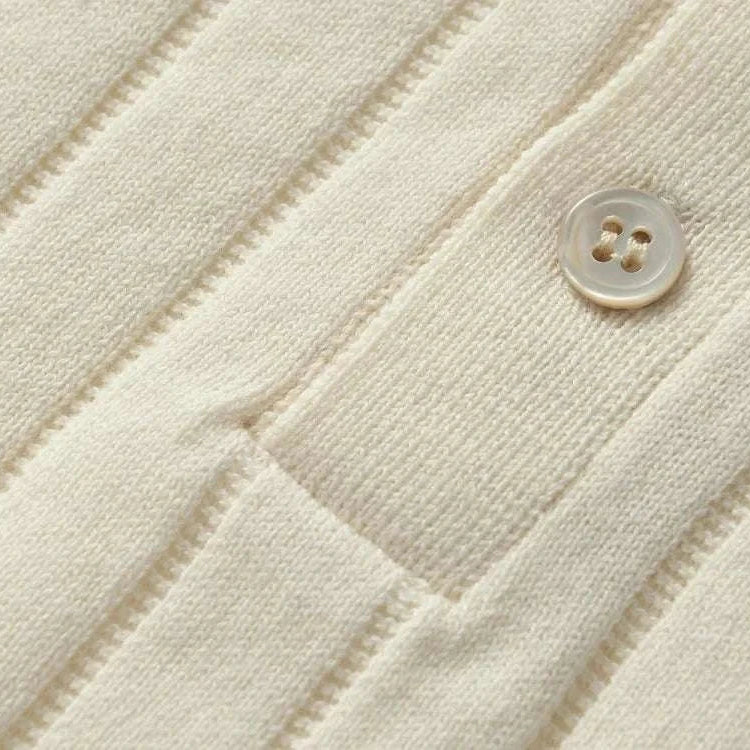 Close-up of a vintage business cotton summer t-shirt with button detail and ribbed texture.