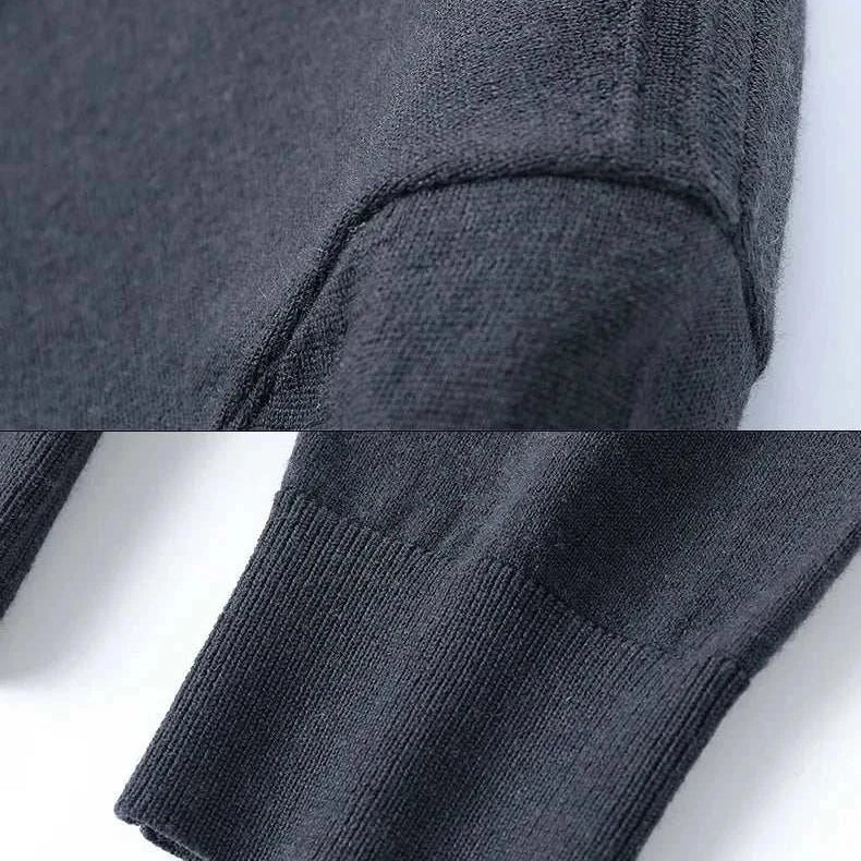 Close-up of details on a dark wool and cotton polo sweater sleeve and shoulder, highlighting the texture and craftsmanship of the Antonios wool polo sweater.