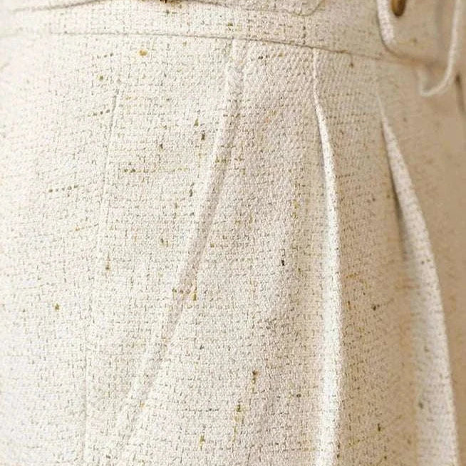 Paris high-waist design trousers in solid fabric with a sophisticated buckle detail, perfect for casual and smart casual wear.