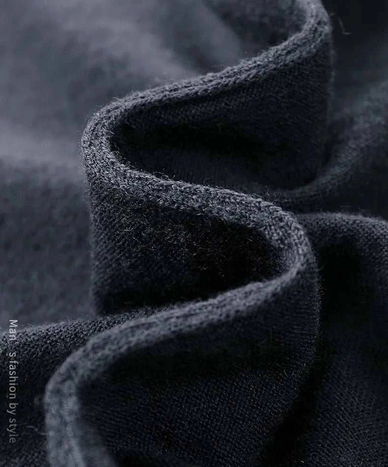 Close-up of soft, textured fabric of Antonios wool polo sweater, showcasing wool and cotton blend.