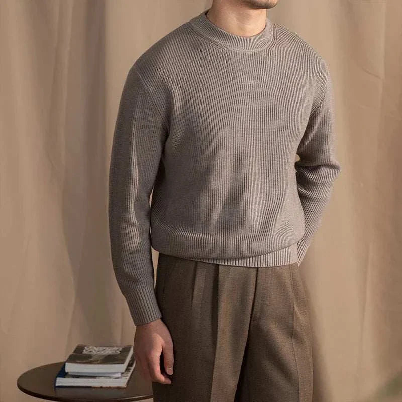 Men's autumn warm wool sweater in solid color on model, perfect for chilly days.