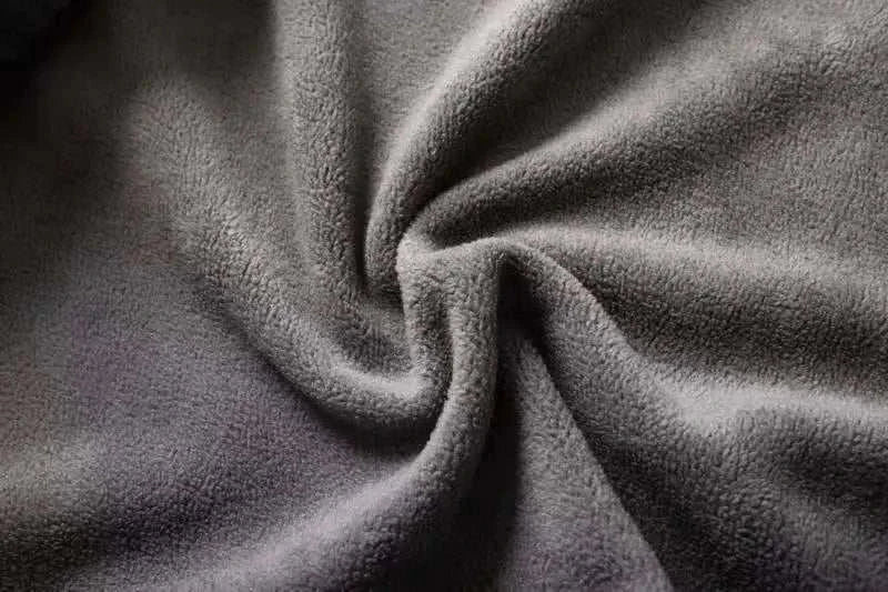 Soft grey fabric detail of Norway puffer jacket.