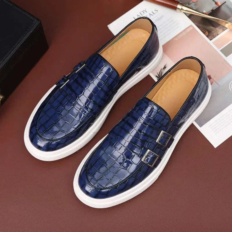Stylish blue Monk double strap loafers with sleek design and cushioned insole.
