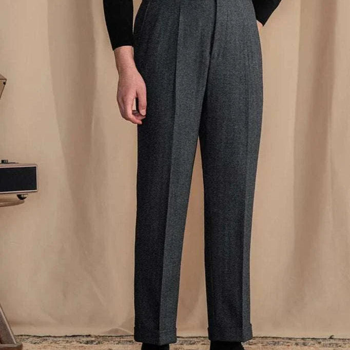 Antonios vintage wool herringbone pants with elegant, full-length design.