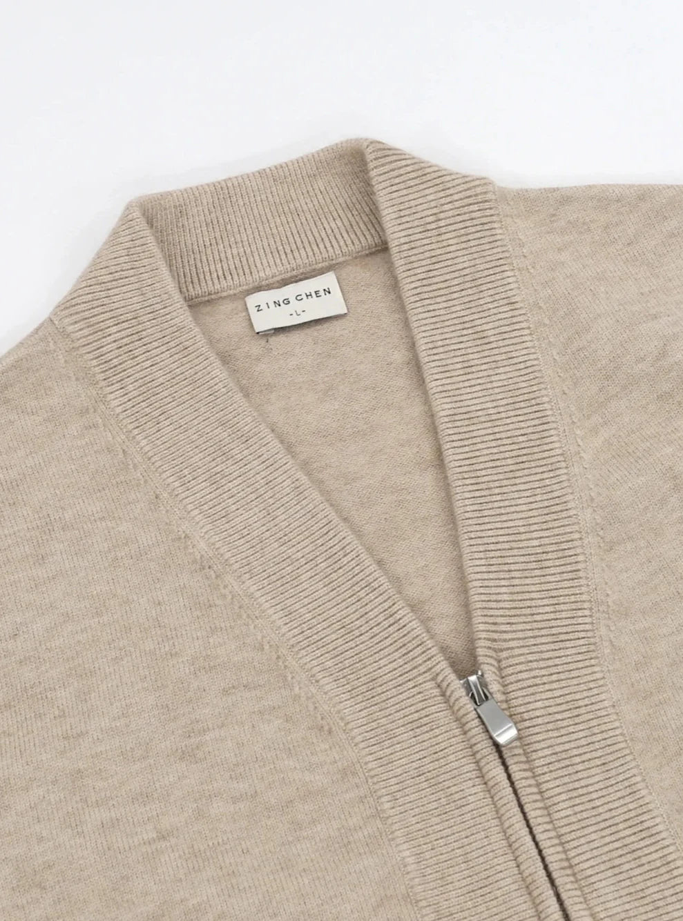 British pullover old money cardigan made of warm wool and polyester.