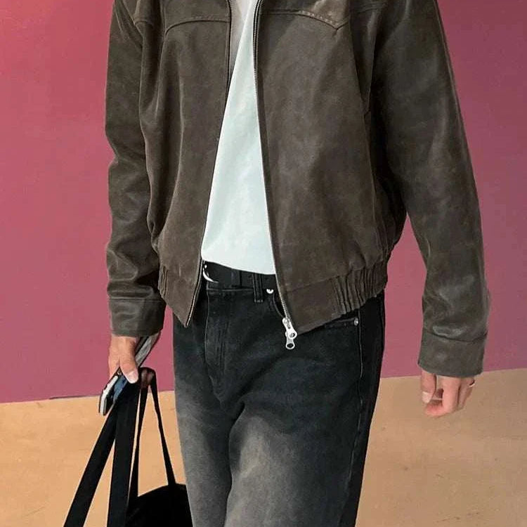 Autumn vintage PU leather jacket for men in brown, styled casually with jeans.