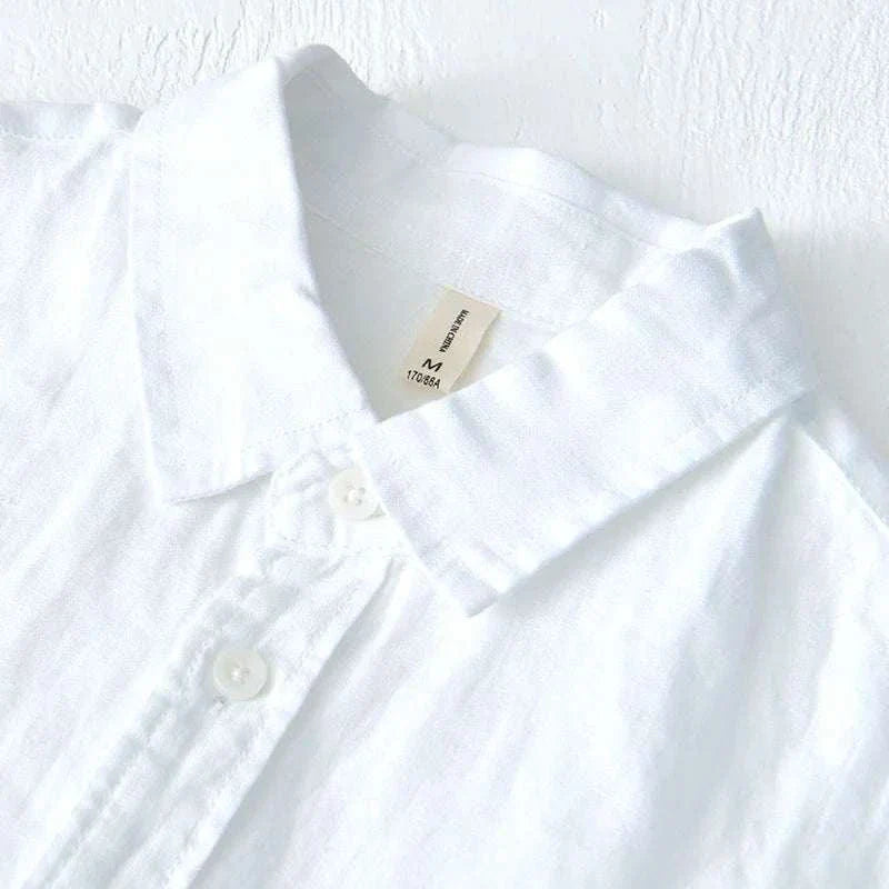 Italian pure linen long-sleeve shirt in white, casual and elegant design for spring/summer.