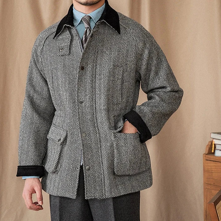 Men's wool heavy vintage coat with herringbone pattern and black collar.