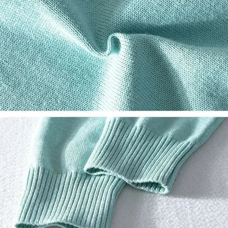 Light blue autumn half zipper cotton sweater fabric and cuffs detail.