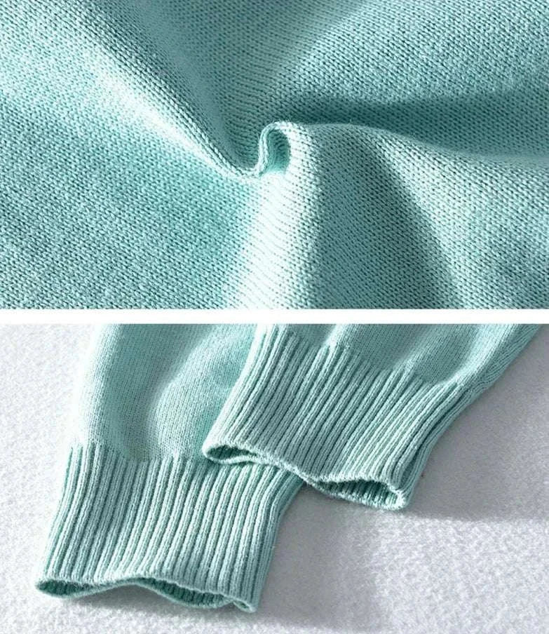 Light blue autumn half zipper cotton sweater fabric and cuffs detail.