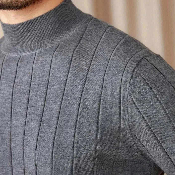 Autumn turtleneck premium sweater in gray wool blend with ribbed texture.