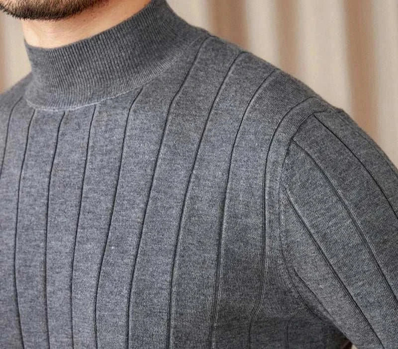 Autumn turtleneck premium sweater in gray wool blend with ribbed texture.