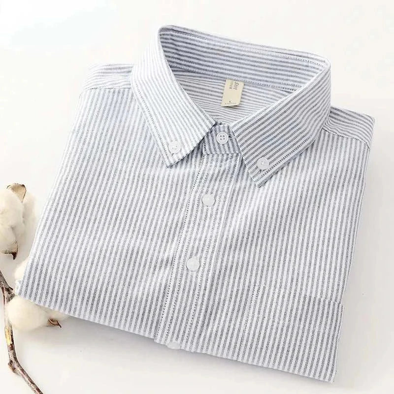 Business casual slim fit shirt with striped design, folded neatly.