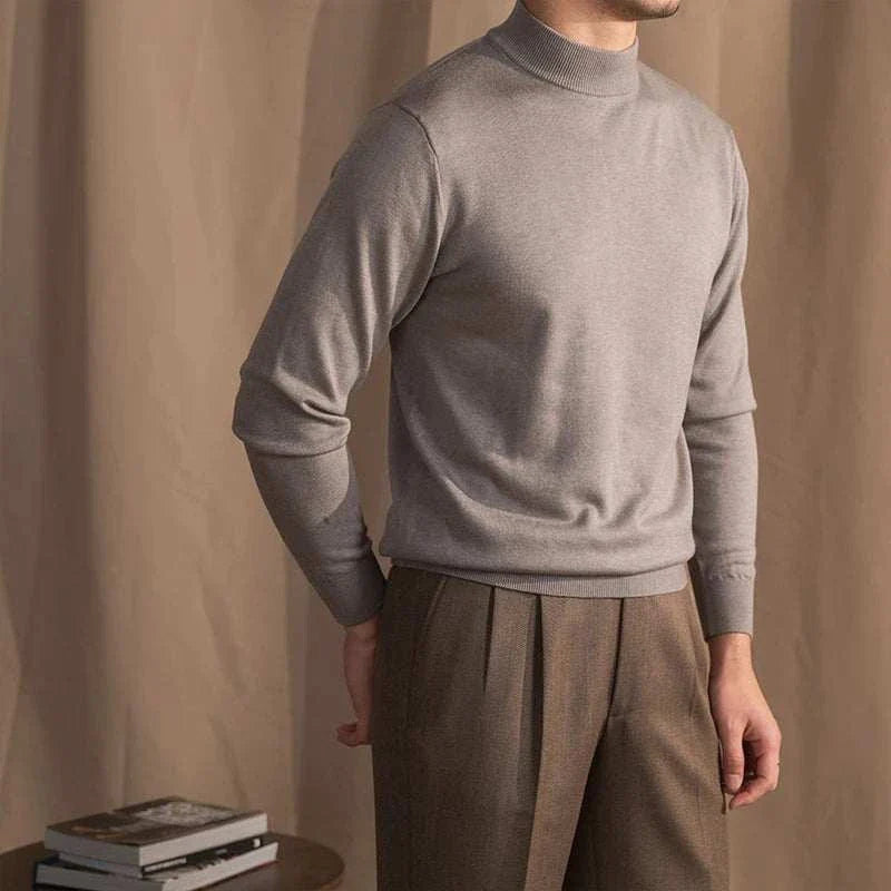 Man wearing Antonios slim fit half-turtleneck sweater in gray.