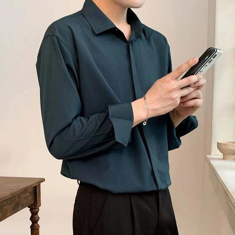 Business loose long-sleeve shirt for men, ideal for spring/summer seasons, solid pattern.