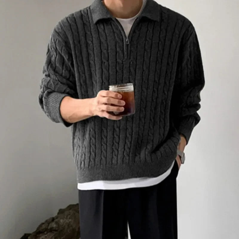 Men's vintage design sweater in dark grey with cable knit pattern, casual style.