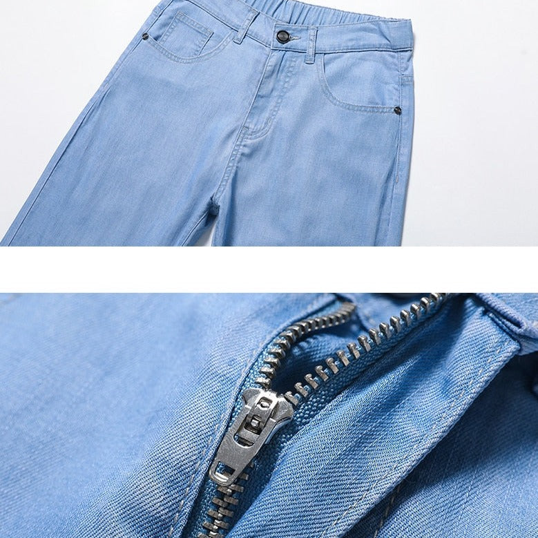 Light blue Vinny Jeans showcasing soft fabric with a close-up of the zipper. Perfect for casual and semi-formal settings.