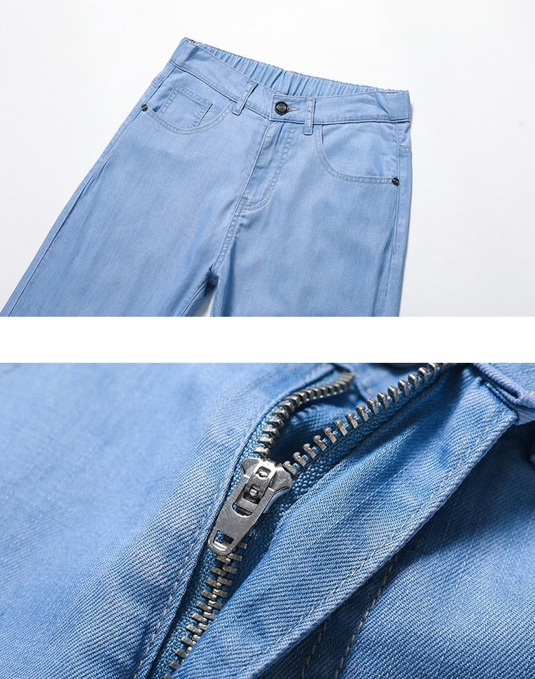 Light blue Vinny Jeans showcasing soft fabric with a close-up of the zipper. Perfect for casual and semi-formal settings.