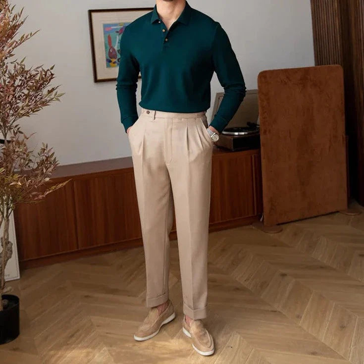 Man wearing a heavy premium sweater in a casual elegant style.
