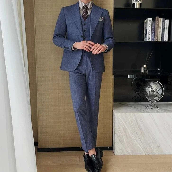Groom wedding 3 piece suit with a stylish vest, jacket, and trousers in high-quality fabric.