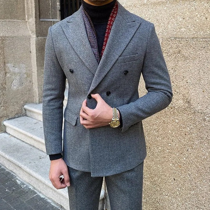 Office double breasted suit in elegant gray with intricate pattern, Italian style.