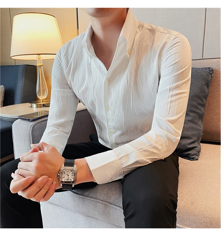LUXE Long-Sleeve Shirt in white, cotton-linen blend, worn by a seated person with stylish fit.