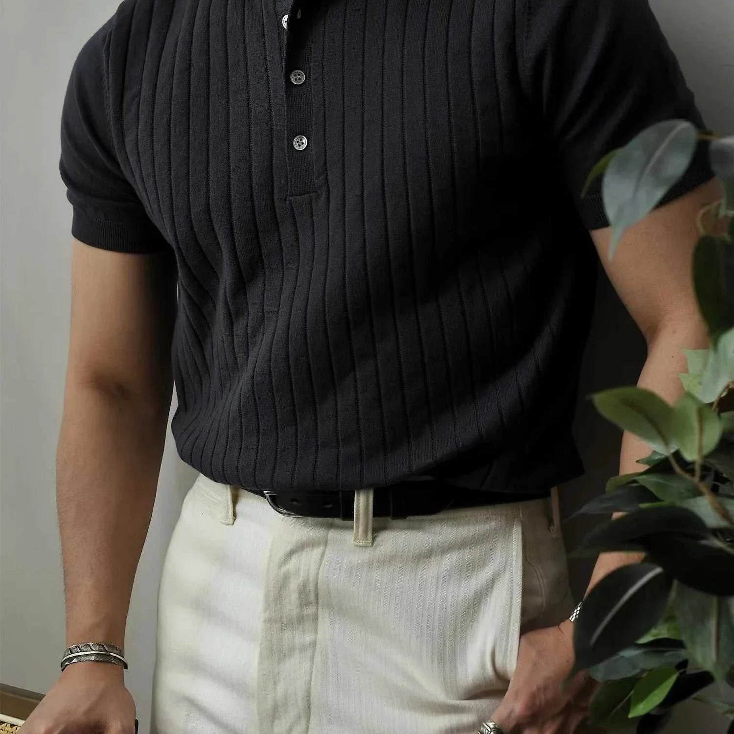 Vintage business cotton summer t-shirt with classic collar, styled elegantly with white pants.