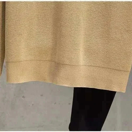 Antonio's half zipper sweater in beige fabric, showcasing soft polyester-wool blend for winter comfort.