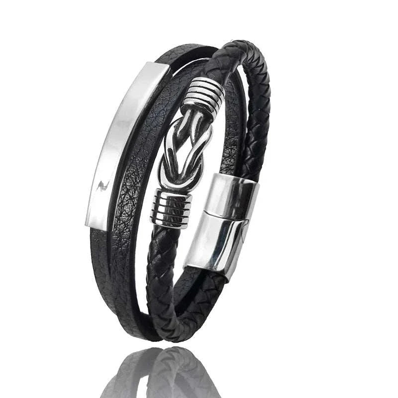 Triple layer leather bracelet with stainless steel accents.