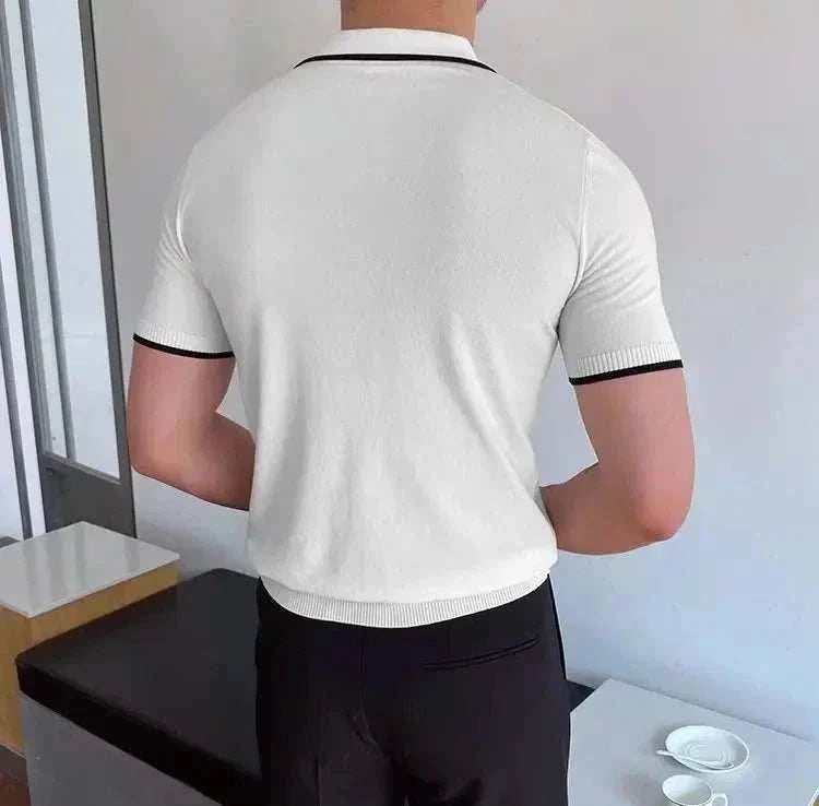 Men's polo collar relaxed fit t-shirt in white with black trim, back view.