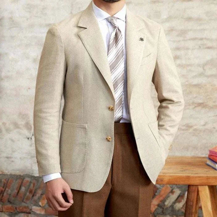 Slim fit cotton-linen blend jacket on a man in a stylish setting.
