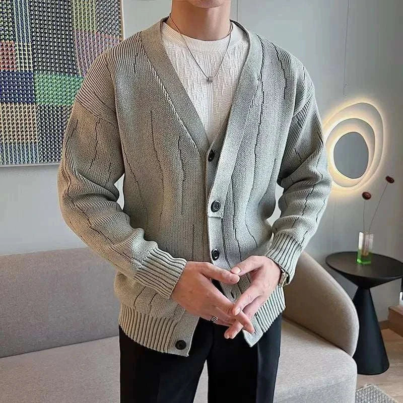 Retro v-shape winter cardigan for men in high-quality polyester, cozy and stylish.