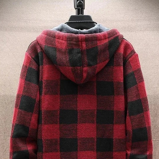 Red and black LUXELY plaid jacket with hood hanging on a rack.