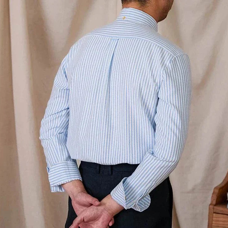 Oxford style casual cotton shirt in blue stripes for men, breathable and relaxed fit.