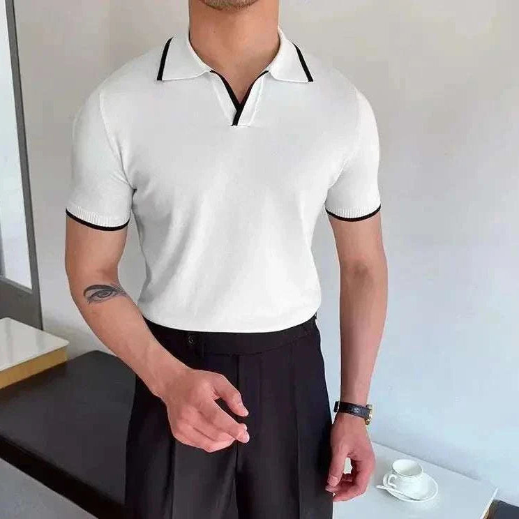 Men's white polo collar relaxed fit t-shirt with black trim.
