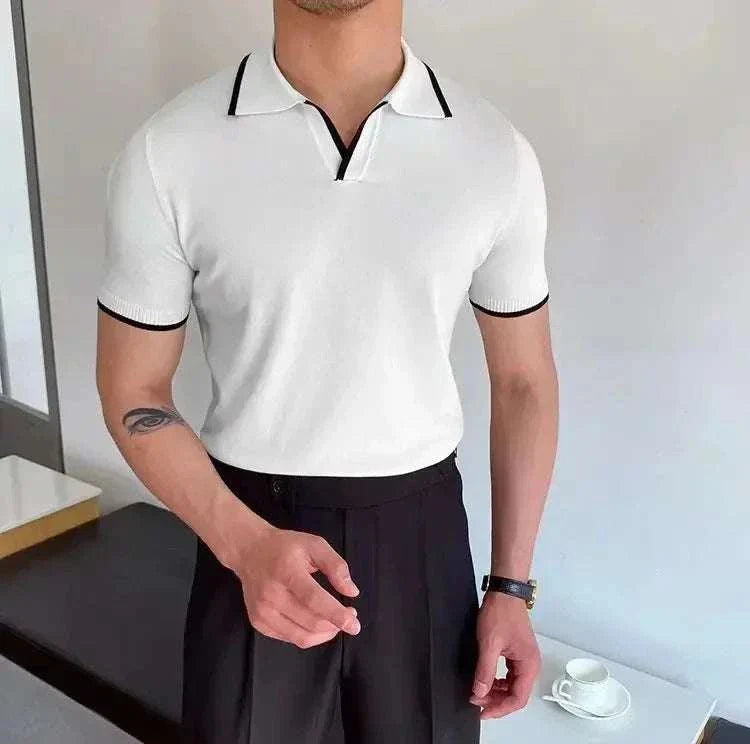 Men's white polo collar relaxed fit t-shirt with black trim.