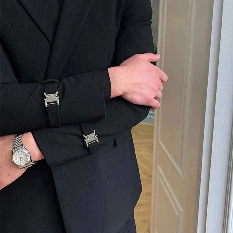 Elegant slim fit suit jacket with stylish sleeve buckles.