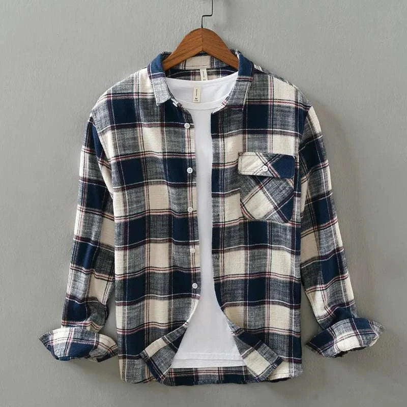 Korean plaid long-sleeve shirt hanging on hanger in blue and white pattern.