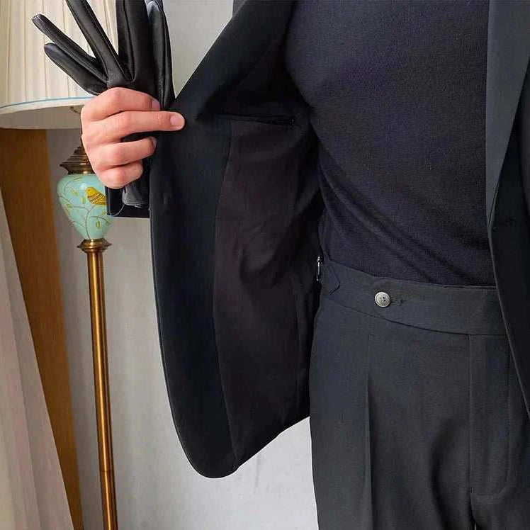 Formal elegant premium 2 piece suit with blazer and pants made from polyester.