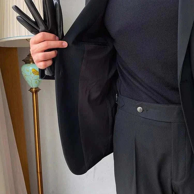 Formal elegant premium 2 piece suit with blazer and pants made from polyester.