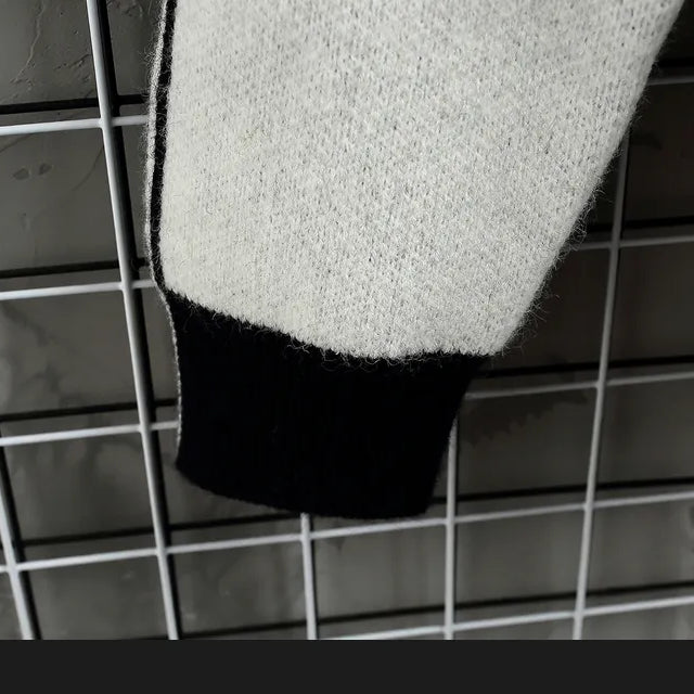 Men's casual Norway sweater sleeve detail in wool and polyester blend.