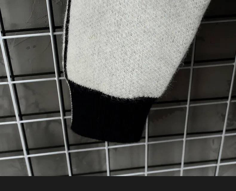 Men's casual Norway sweater sleeve detail in wool and polyester blend.