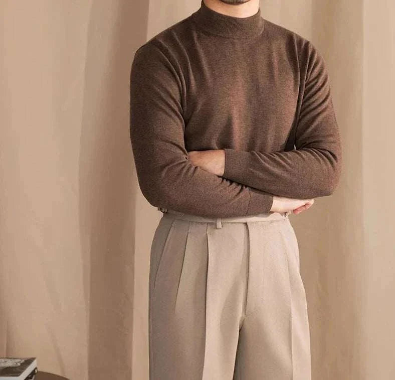 Man wearing a brown Antonios slim fit half-turtleneck sweater and beige trousers.