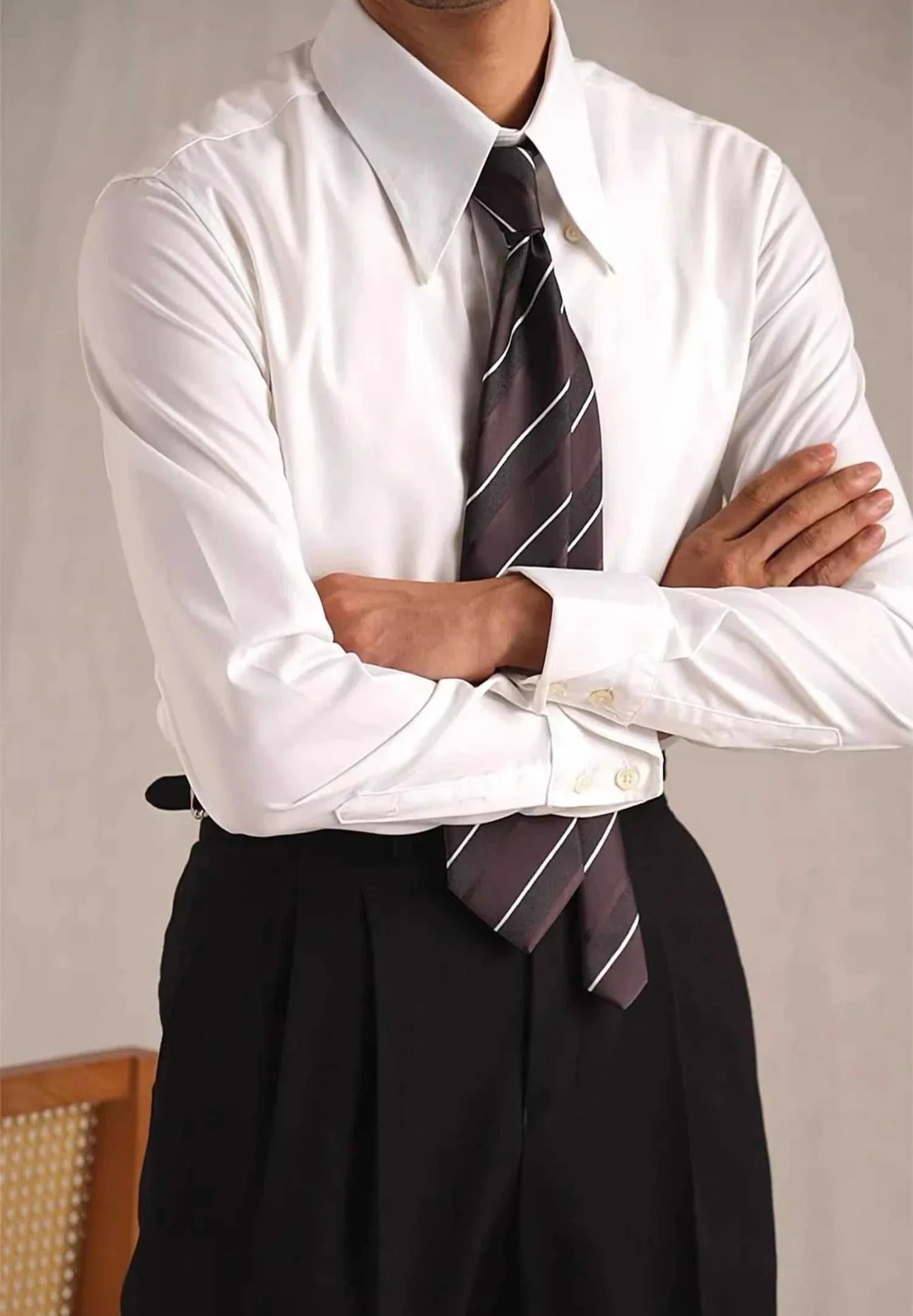 Party tuxedo long sleeve shirt in sleek white with black tie.