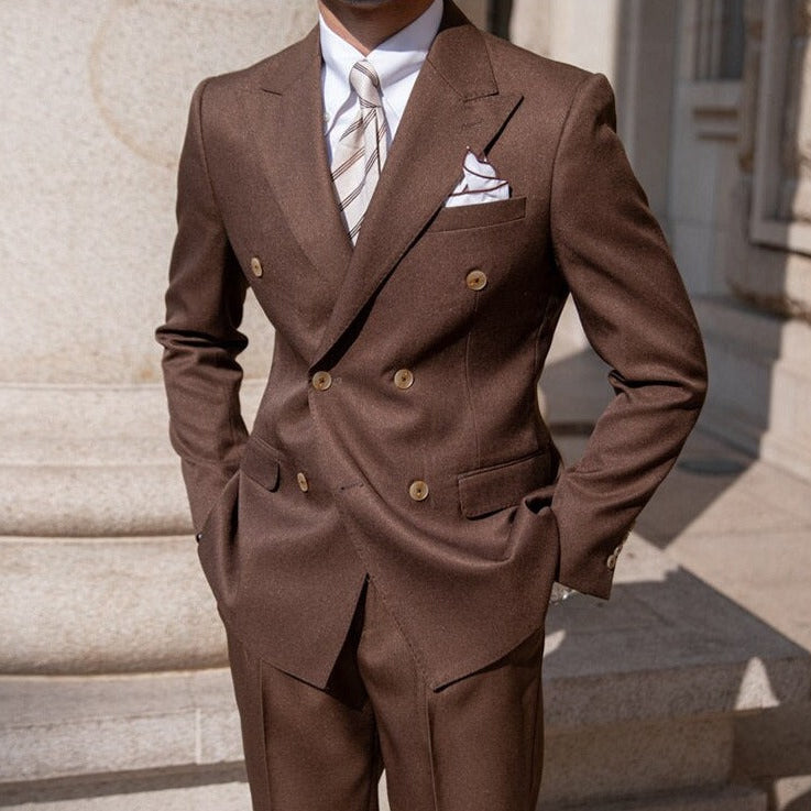 Brown Antonios Double Breast Suit with a sophisticated solid pattern, ideal for business or special events.