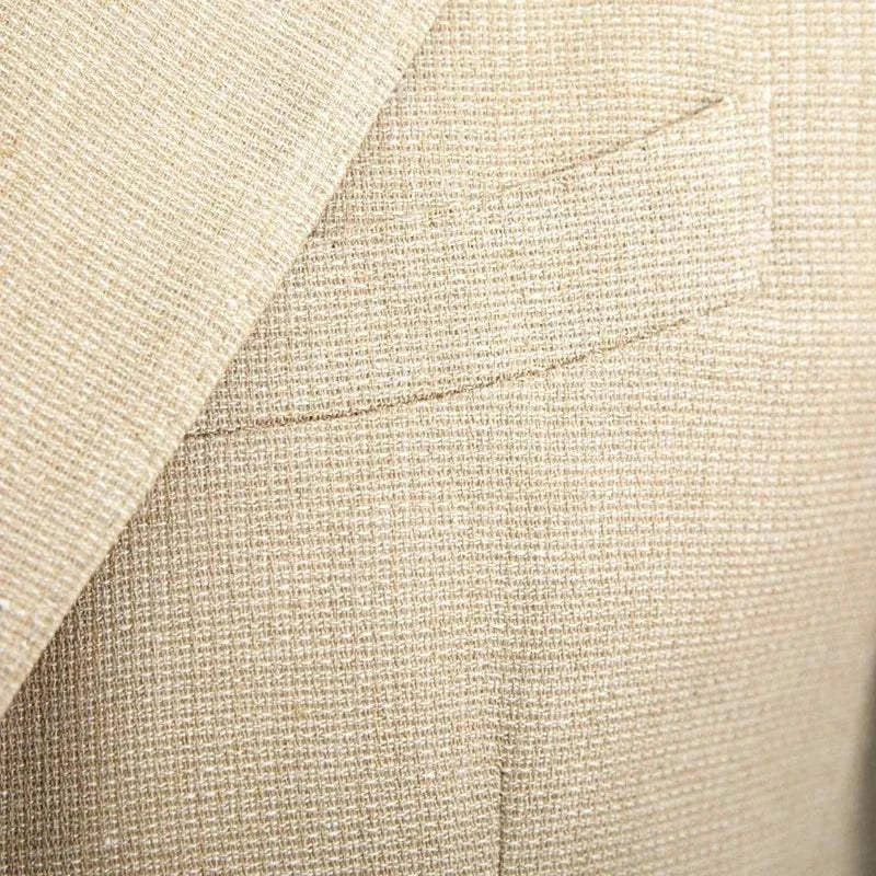 Slim fit cotton-linen blend jacket close-up showing fabric texture and stitching details.